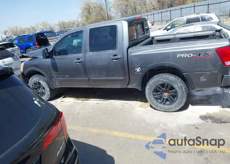 2012 Nissan Titan Pro-4X z USA, uszkodzony, nr VIN 1N6BA0EC7CN304116